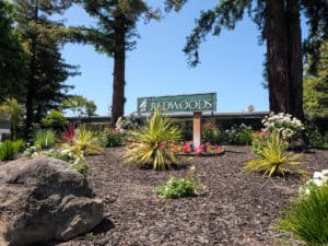 redwoods hayward apartment outdoor sign landscaped